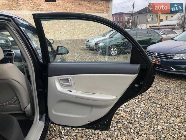 Чорний Кіа Черато, об'ємом двигуна 2 л та пробігом 177 тис. км за 4399 $, фото 18 на Automoto.ua