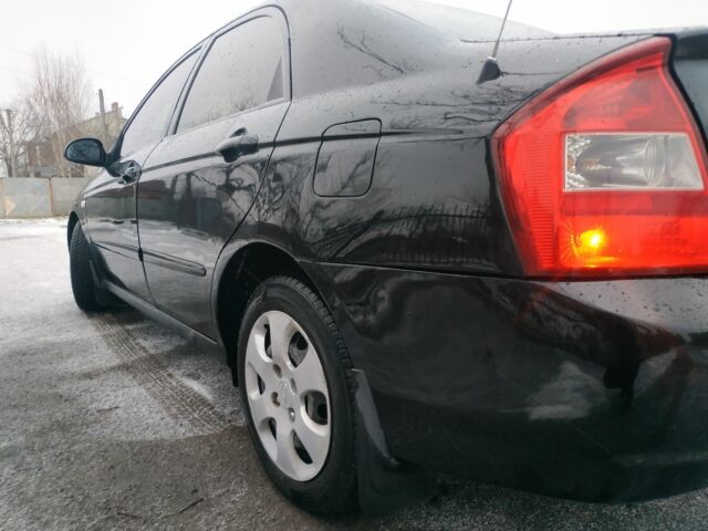 Черный Киа Черато, объемом двигателя 0 л и пробегом 210 тыс. км за 2500 $, фото 6 на Automoto.ua