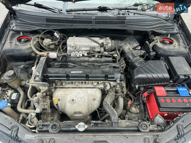 Черный Киа Черато, объемом двигателя 1.98 л и пробегом 236 тыс. км за 4100 $, фото 20 на Automoto.ua