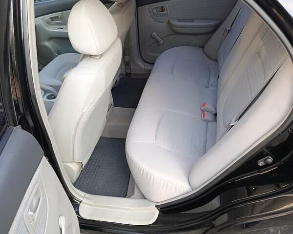 Чорний Кіа Черато, об'ємом двигуна 1.6 л та пробігом 237 тис. км за 5300 $, фото 22 на Automoto.ua