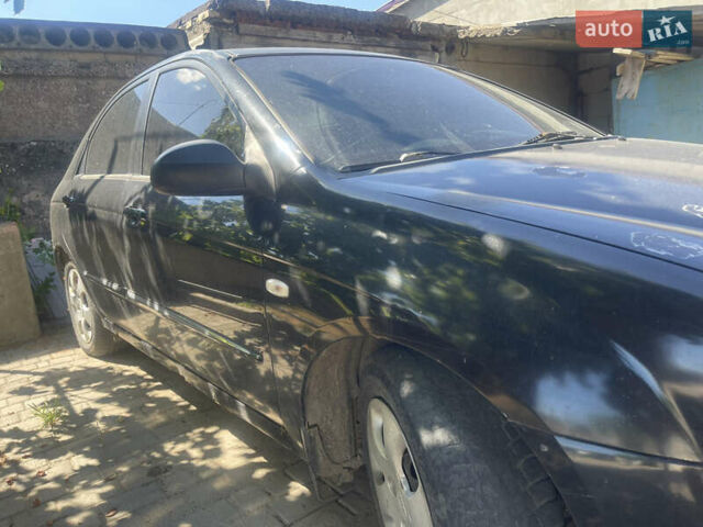 Чорний Кіа Черато, об'ємом двигуна 1.59 л та пробігом 202 тис. км за 2999 $, фото 4 на Automoto.ua