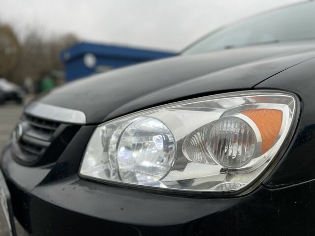 Черный Киа Черато, объемом двигателя 1.6 л и пробегом 230 тыс. км за 3200 $, фото 7 на Automoto.ua