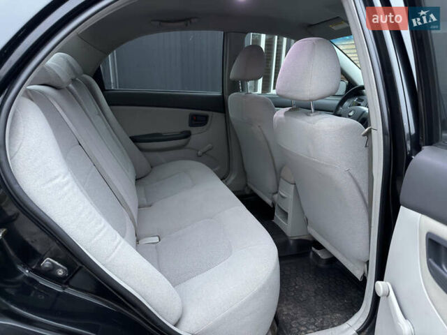 Черный Киа Черато, объемом двигателя 1.6 л и пробегом 220 тыс. км за 3300 $, фото 16 на Automoto.ua