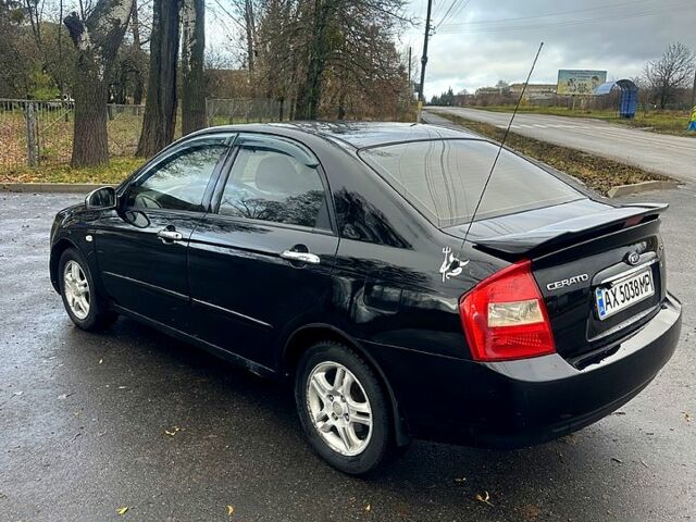 Черный Киа Черато, объемом двигателя 2 л и пробегом 232 тыс. км за 4100 $, фото 6 на Automoto.ua