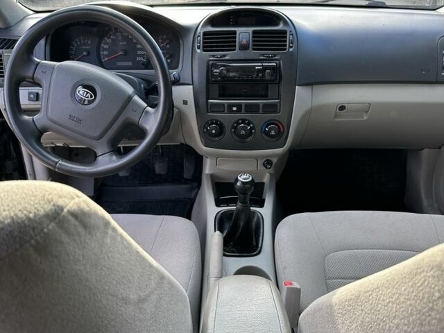 Черный Киа Черато, объемом двигателя 1.6 л и пробегом 245 тыс. км за 2850 $, фото 9 на Automoto.ua