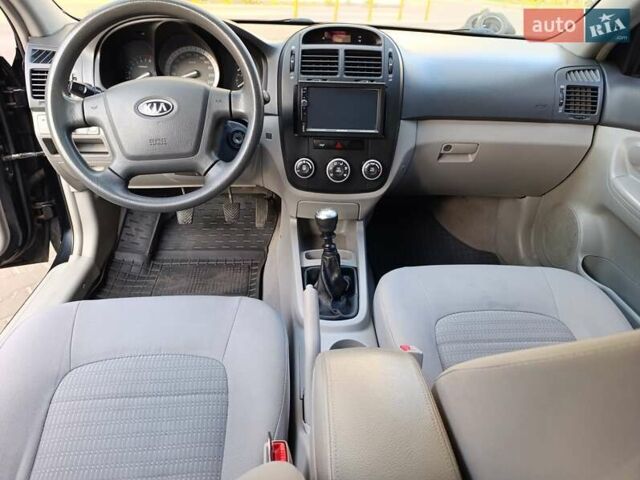 Чорний Кіа Черато, об'ємом двигуна 1.6 л та пробігом 237 тис. км за 5300 $, фото 29 на Automoto.ua
