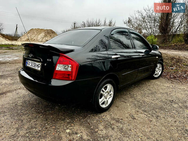 Чорний Кіа Черато, об'ємом двигуна 1.98 л та пробігом 240 тис. км за 5100 $, фото 4 на Automoto.ua