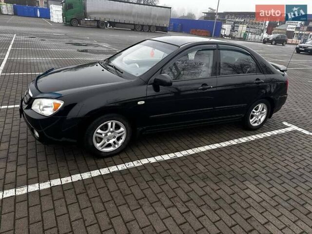 Черный Киа Черато, объемом двигателя 1.98 л и пробегом 190 тыс. км за 3850 $, фото 18 на Automoto.ua