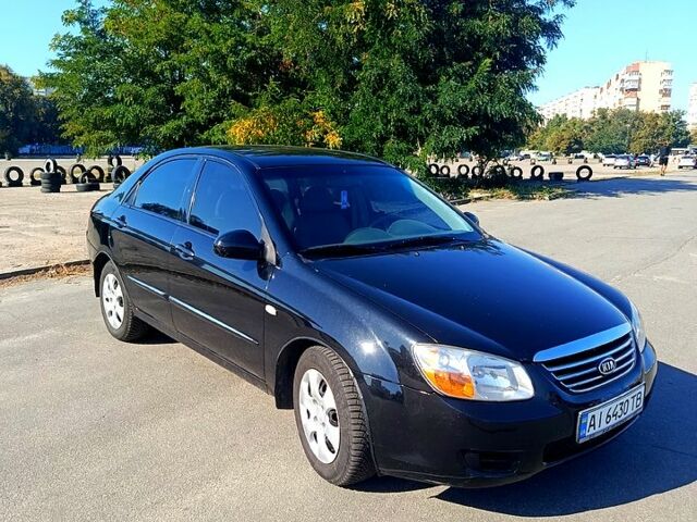 Чорний Кіа Черато, об'ємом двигуна 1.6 л та пробігом 367 тис. км за 3900 $, фото 2 на Automoto.ua