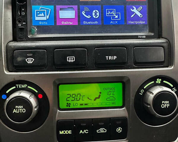 Чорний Кіа Черато, об'ємом двигуна 1.98 л та пробігом 240 тис. км за 5100 $, фото 12 на Automoto.ua