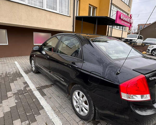 Черный Киа Черато, объемом двигателя 1.6 л и пробегом 232 тыс. км за 4300 $, фото 17 на Automoto.ua