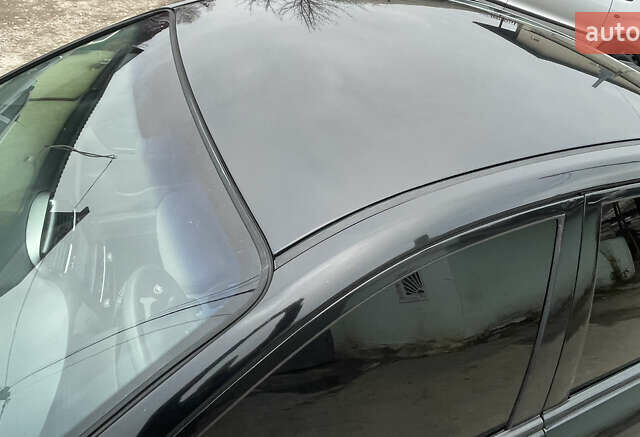 Черный Киа Черато, объемом двигателя 2 л и пробегом 318 тыс. км за 3900 $, фото 5 на Automoto.ua