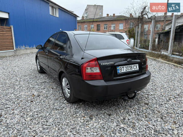 Черный Киа Черато, объемом двигателя 1.6 л и пробегом 220 тыс. км за 3300 $, фото 9 на Automoto.ua
