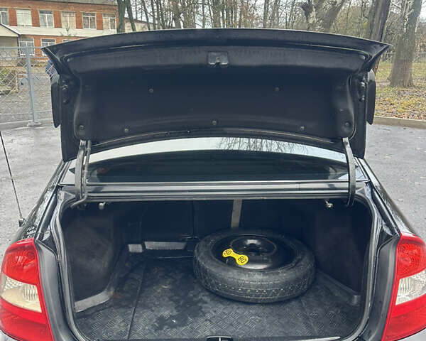 Черный Киа Черато, объемом двигателя 1.98 л и пробегом 236 тыс. км за 4100 $, фото 18 на Automoto.ua