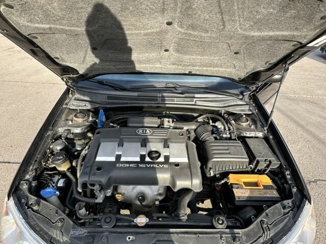 Черный Киа Черато, объемом двигателя 1.6 л и пробегом 245 тыс. км за 2850 $, фото 6 на Automoto.ua