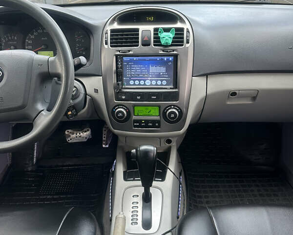 Черный Киа Черато, объемом двигателя 1.98 л и пробегом 236 тыс. км за 4100 $, фото 14 на Automoto.ua