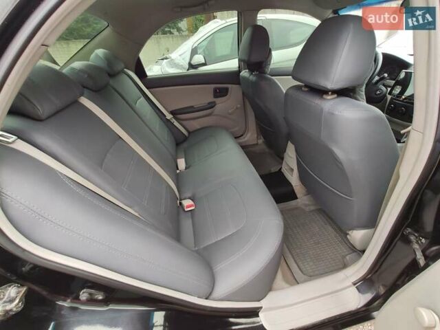 Черный Киа Черато, объемом двигателя 1.59 л и пробегом 203 тыс. км за 4400 $, фото 8 на Automoto.ua