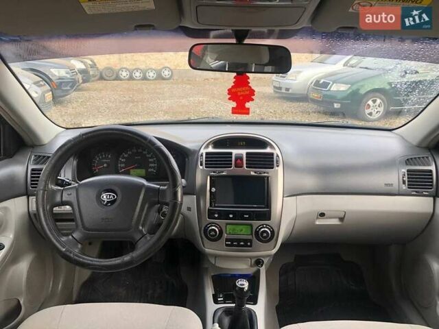 Чорний Кіа Черато, об'ємом двигуна 2 л та пробігом 177 тис. км за 4399 $, фото 26 на Automoto.ua