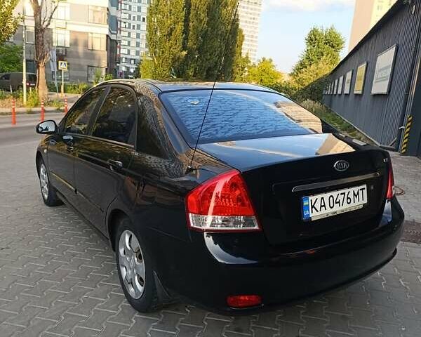 Чорний Кіа Черато, об'ємом двигуна 1.6 л та пробігом 237 тис. км за 5300 $, фото 13 на Automoto.ua