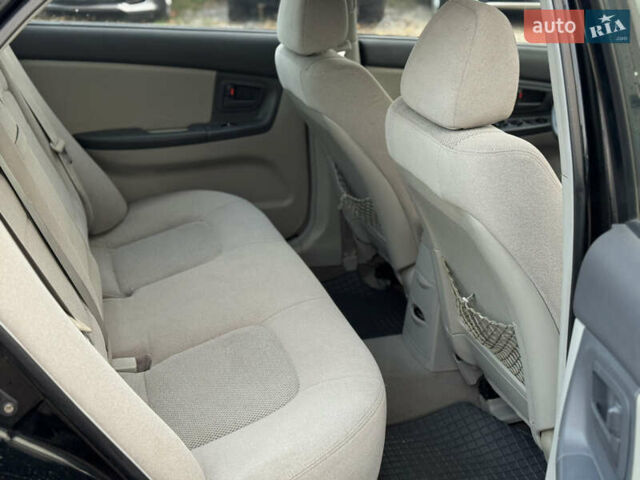 Киа Черато 2006 в Киеве на Automoto.ua Черный Киа Черато, объемом двигателя 2 л и пробегом 260 тыс. км за 4800 $, фото 13 на Automoto.ua