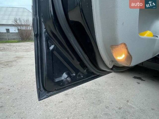 Черный Киа Черато, объемом двигателя 2 л и пробегом 318 тыс. км за 3900 $, фото 14 на Automoto.ua