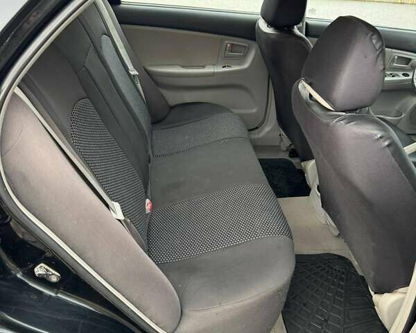 Чорний Кіа Черато, об'ємом двигуна 1.98 л та пробігом 177 тис. км за 3950 $, фото 6 на Automoto.ua