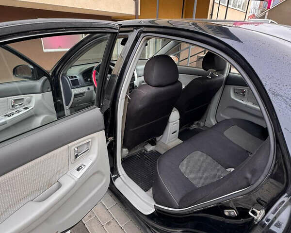 Черный Киа Черато, объемом двигателя 1.6 л и пробегом 232 тыс. км за 4300 $, фото 12 на Automoto.ua