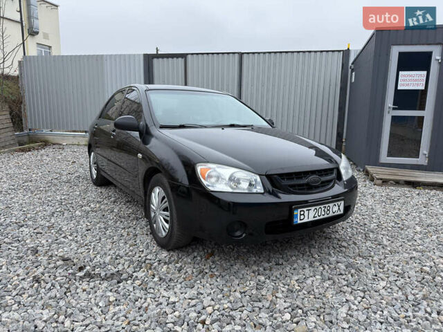 Черный Киа Черато, объемом двигателя 1.6 л и пробегом 220 тыс. км за 3300 $, фото 2 на Automoto.ua