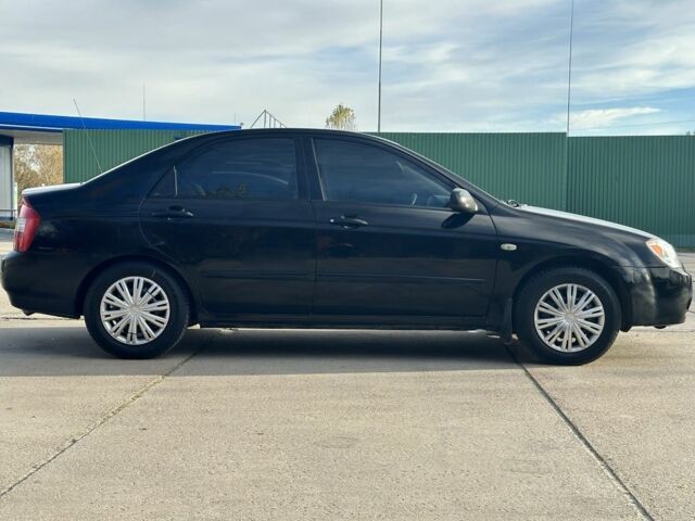 Черный Киа Черато, объемом двигателя 1.6 л и пробегом 245 тыс. км за 2850 $, фото 2 на Automoto.ua