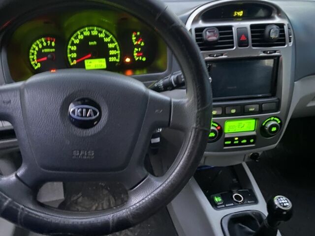 Черный Киа Черато, объемом двигателя 2 л и пробегом 240 тыс. км за 3300 $, фото 6 на Automoto.ua