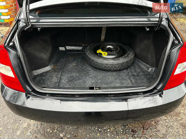 Чорний Кіа Черато, об'ємом двигуна 1.98 л та пробігом 240 тис. км за 5100 $, фото 15 на Automoto.ua