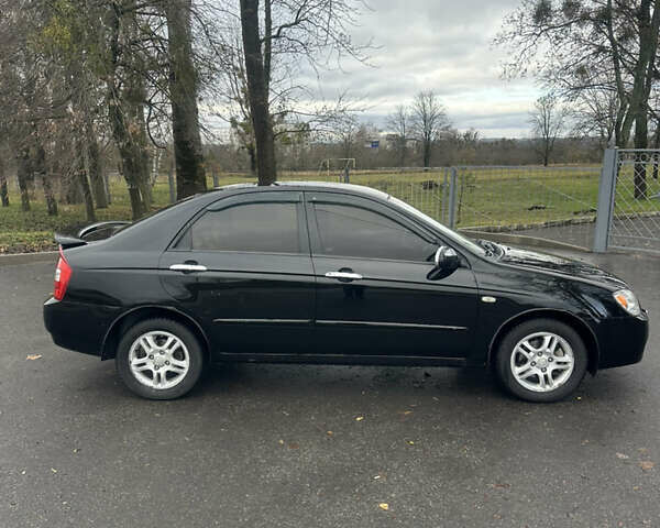 Черный Киа Черато, объемом двигателя 1.98 л и пробегом 236 тыс. км за 4100 $, фото 3 на Automoto.ua