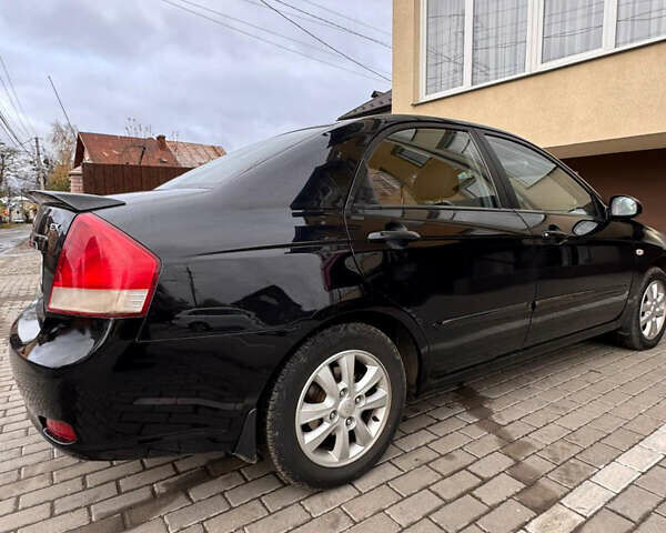 Черный Киа Черато, объемом двигателя 1.6 л и пробегом 232 тыс. км за 4300 $, фото 9 на Automoto.ua