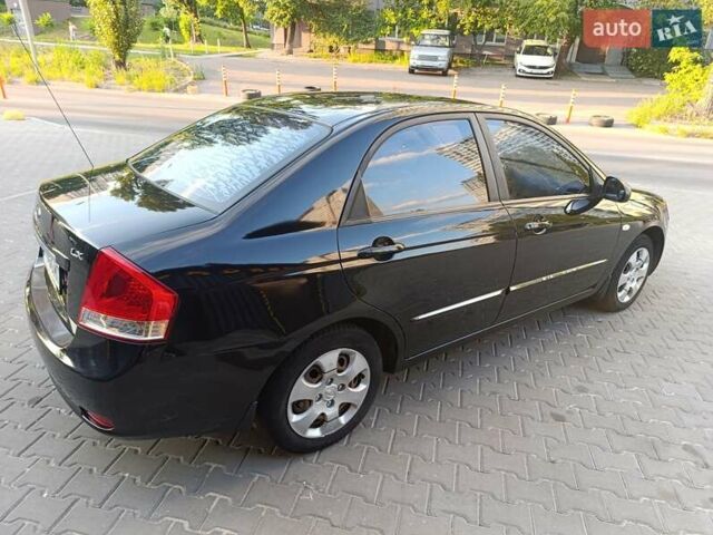 Чорний Кіа Черато, об'ємом двигуна 1.6 л та пробігом 237 тис. км за 5300 $, фото 14 на Automoto.ua