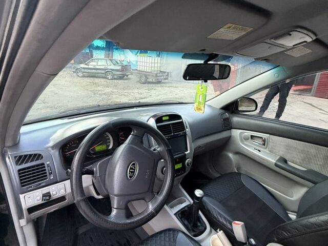 Черный Киа Черато, объемом двигателя 1.6 л и пробегом 286 тыс. км за 3500 $, фото 6 на Automoto.ua