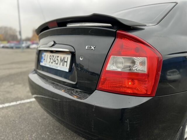 Черный Киа Черато, объемом двигателя 1.6 л и пробегом 230 тыс. км за 3200 $, фото 9 на Automoto.ua