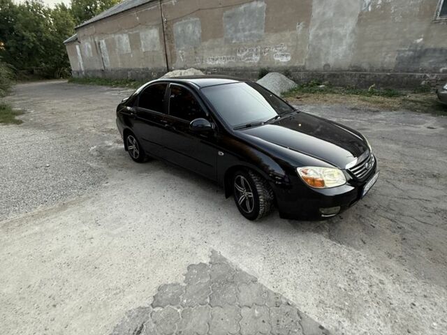 Черный Киа Черато, объемом двигателя 1.6 л и пробегом 286 тыс. км за 3500 $, фото 5 на Automoto.ua