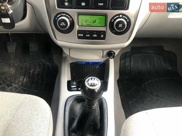 Чорний Кіа Черато, об'ємом двигуна 2 л та пробігом 177 тис. км за 4399 $, фото 25 на Automoto.ua