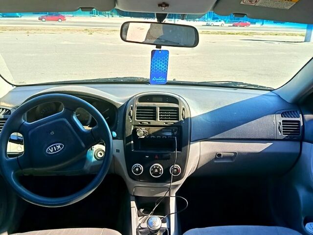 Чорний Кіа Черато, об'ємом двигуна 1.6 л та пробігом 367 тис. км за 3900 $, фото 5 на Automoto.ua