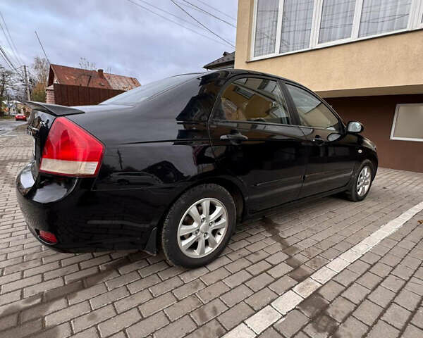 Черный Киа Черато, объемом двигателя 1.6 л и пробегом 232 тыс. км за 4300 $, фото 7 на Automoto.ua