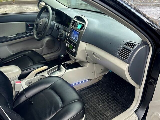 Черный Киа Черато, объемом двигателя 2 л и пробегом 232 тыс. км за 4100 $, фото 10 на Automoto.ua