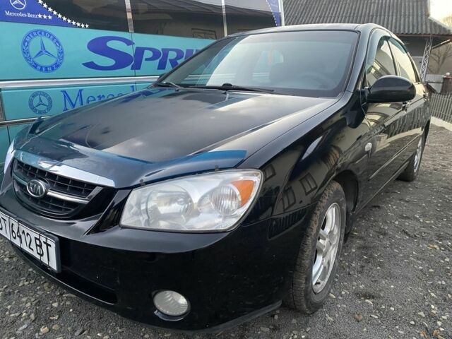 Черный Киа Черато, объемом двигателя 2 л и пробегом 240 тыс. км за 3300 $, фото 4 на Automoto.ua