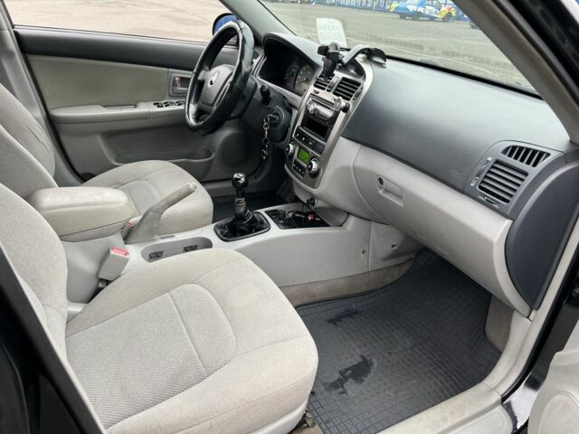 Черный Киа Черато, объемом двигателя 1.6 л и пробегом 230 тыс. км за 3200 $, фото 13 на Automoto.ua