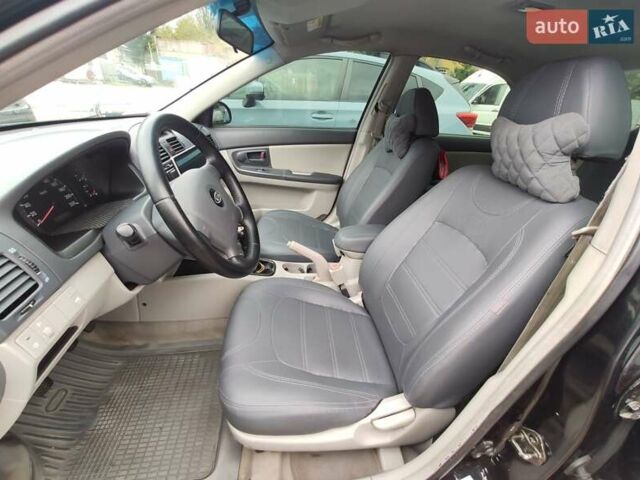 Черный Киа Черато, объемом двигателя 1.59 л и пробегом 203 тыс. км за 4400 $, фото 11 на Automoto.ua