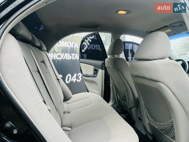 Чорний Кіа Черато, об'ємом двигуна 2 л та пробігом 319 тис. км за 4300 $, фото 16 на Automoto.ua