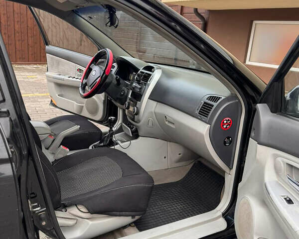 Черный Киа Черато, объемом двигателя 1.6 л и пробегом 232 тыс. км за 4300 $, фото 13 на Automoto.ua