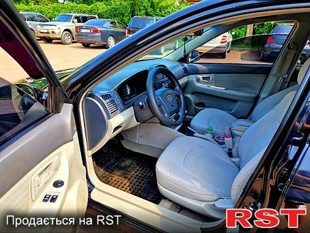 Черный Киа Черато, объемом двигателя 1.6 л и пробегом 300 тыс. км за 4000 $, фото 9 на Automoto.ua