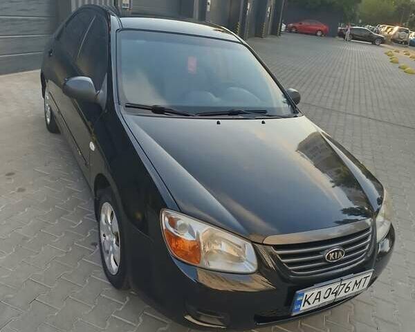 Чорний Кіа Черато, об'ємом двигуна 1.6 л та пробігом 237 тис. км за 5300 $, фото 1 на Automoto.ua