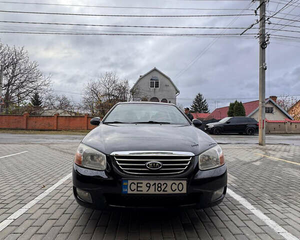 Черный Киа Черато, объемом двигателя 1.6 л и пробегом 232 тыс. км за 4300 $, фото 14 на Automoto.ua