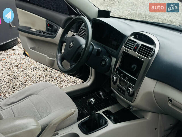 Чорний Кіа Черато, об'ємом двигуна 2 л та пробігом 319 тис. км за 4300 $, фото 19 на Automoto.ua